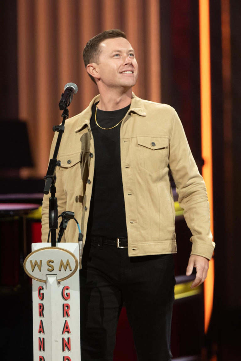 Scotty McCreery receives ovation as 227th cast member of the Grand Ole Opry