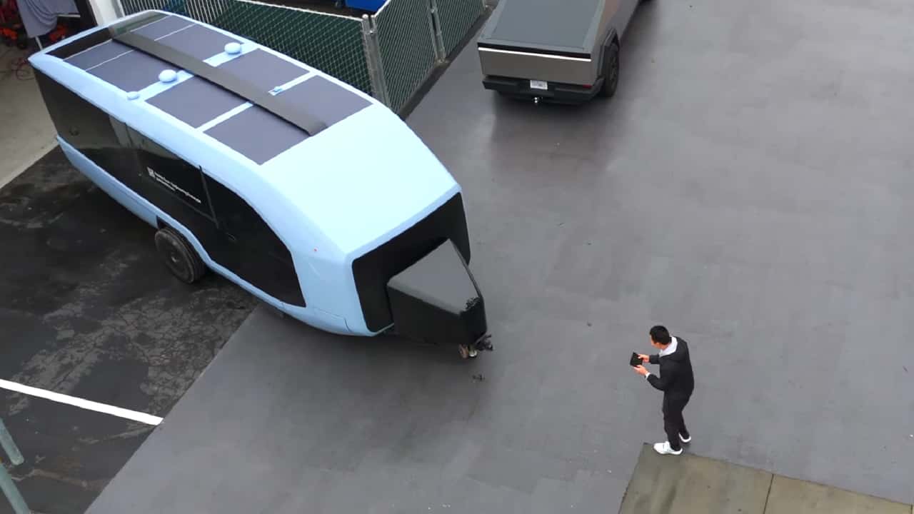 tesla cybertruck tows an electric rv that's controlled like an rc car
