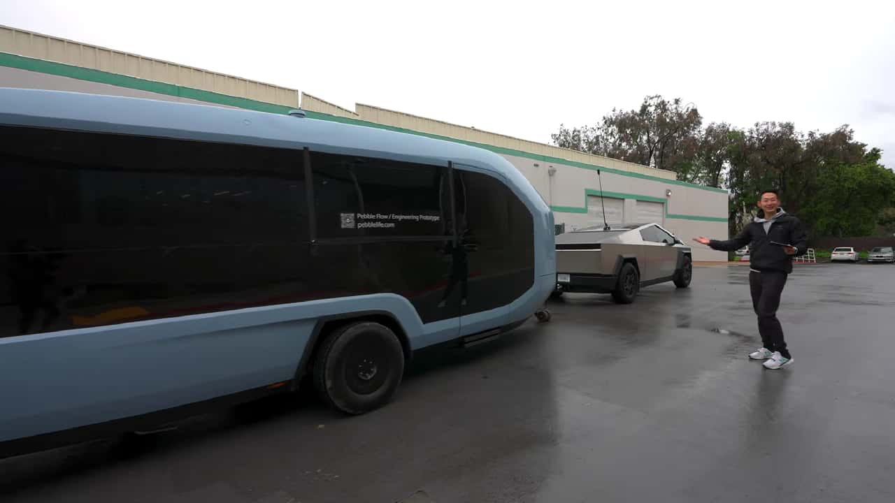 tesla cybertruck tows an electric rv that's controlled like an rc car