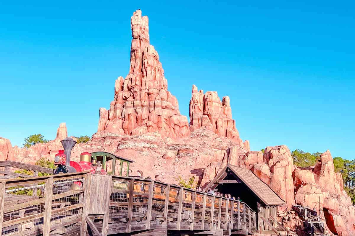 <p>Big Thunder Mountain Railroad, often dubbed “the wildest ride in the wilderness,” is a thrilling jaunt through a rugged gold-mining town on a rickety train. Its high-speed twists and turns offer an exhilarating experience that appeals to thrill-seekers of all ages. </p> <p>Due to its enduring appeal, Genie+ reservations for this ride are in high demand and tend to disappear quickly.</p> <p>To learn more: <a href="https://treasuredfamilytravels.com/magic-kingdom-roller-coasters/">Magic Kingdom Roller Coasters – The Thrill Rides You Need to Ride</a></p>