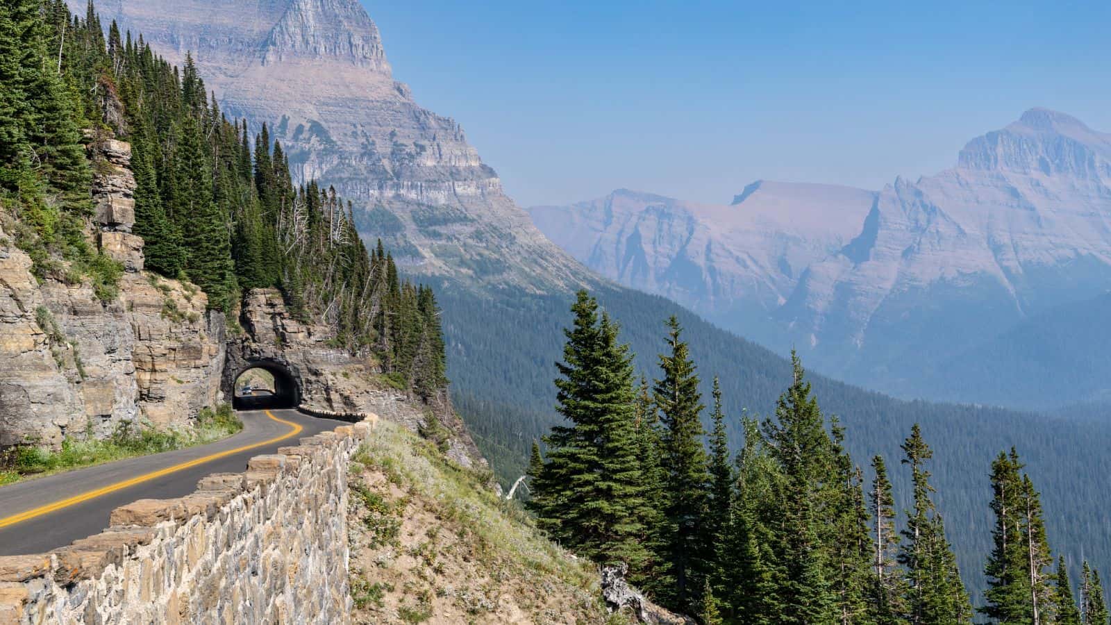 <p>Traverse the spectacular Going-to-the-Sun Road in <a href="https://www.nps.gov/glac/index.htm" rel="nofollow external noopener noreferrer">Glacier National Park</a>, offering awe-inspiring vistas of snow-capped mountains, alpine meadows, and pristine lakes.</p><p>This 50-mile route crosses the Continental Divide, providing breathtaking views from Logan Pass and the Weeping Wall.</p><p>Explore hiking trails, spot wildlife such as grizzly bears and mountain goats, and enjoy the serenity of one of America’s most beautiful national parks. The road is typically open from late June to mid-October, making it a perfect summer and early fall destination.</p>