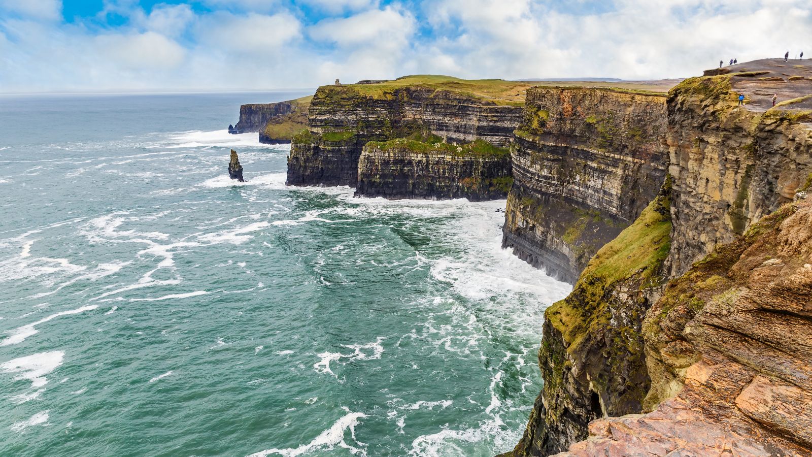 <p>Welcome to one of Ireland’s most popular attractions. This dramatic stretch of coast feels like the end of the earth. Sheer cliffs drop like some impenetrable rock fortress to stormy oceans below.</p><p>A hiking trail around the cliff edge offers sublime panoramic views, but you’ll get that iconic “Cliffs of Moher” shot next door to the visitor center (which is worth checking out, too). Weather permitting, you can spend a happy few hours here just walking and enjoying the scenery.</p>