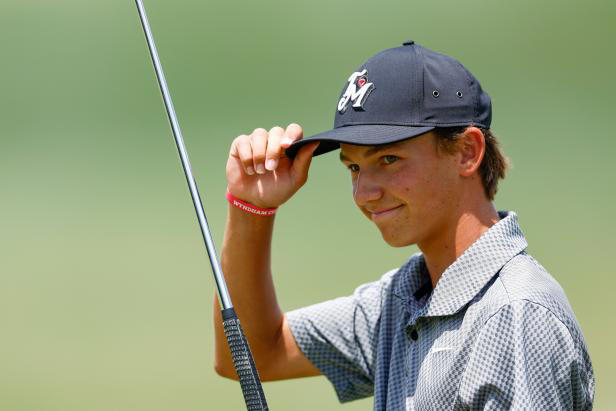 LAKEWOOD RANCH, FLORIDA - APRIL 21: Miles Russell of the United States reacts on the 18th green during the final round of the LECOM Suncoast Classic at Lakewood National Golf Club Commander on April 21, 2024 in Lakewood Ranch, Florida. The 15-year-old golfer made history by becoming the youngest player to make the cut on the Korn Ferry Tour. (Photo by Douglas P. DeFelice/Getty Images)