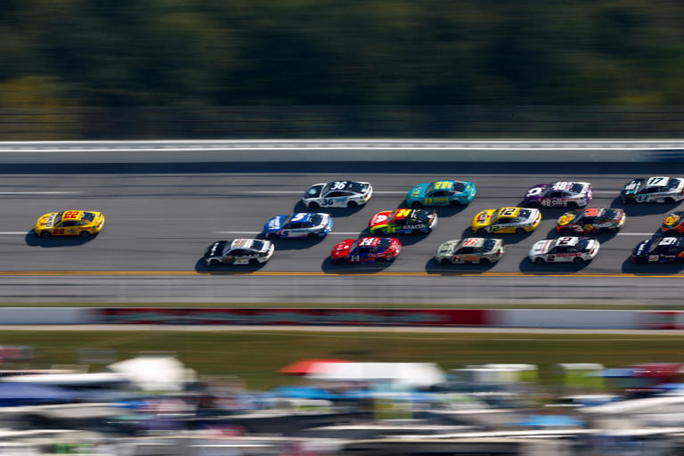 Michael Jordan celebrates NASCAR win at Talladega as NBA playoffs start