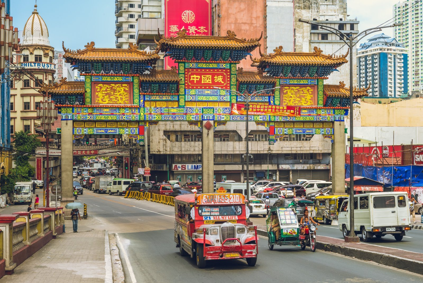 <p class="wp-caption-text">Image Credit: Shutterstock / Richie Chan</p>  <p><span>Binondo, established in 1594, is recognized as the world’s oldest Chinatown, located in the heart of Manila, Philippines. The Spanish founded this historic district as a settlement for Catholic Chinese, and it has since evolved into a vibrant commercial and cultural hub, reflecting a rich blend of Filipino and Chinese influences. Binondo’s intricate network of streets and alleys teems with shops, restaurants, and vendors, offering an array of goods from traditional Chinese medicine to gold jewelry and various culinary delights.</span></p> <p><span>The area is renowned for its unique culinary scene, where traditional Chinese cuisine meets Filipino flavors, resulting in a diverse gastronomic experience. Notable food destinations include Ongpin Street, known for its authentic Chinese restaurants and bakeries serving delicacies such as dim sum, noodles, and hopia. With its distinctive octagonal bell tower, the Binondo Church highlights the district’s historical and religious significance, serving the spiritual needs of its predominantly Chinese Catholic community.</span></p> <p><span>Binondo’s economic activity centers mainly on family-owned businesses and trade, contributing significantly to Manila’s economy. The district’s narrow streets are lined with various shops and stalls, offering everything from textiles to hardware, showcasing the entrepreneurial spirit of its residents.</span></p> <p><span>In recent years, Binondo has experienced a resurgence of interest as a cultural and tourist destination. Efforts to preserve its historical landmarks and revitalize its streets have attracted locals and tourists to explore its rich heritage and traditions. Walking tours, cultural festivals, and the annual Chinese New Year celebration highlight Binondo’s vibrant community life and its role as a living museum of Filipino-Chinese history.</span></p> <p><b>My Insider’s Tip: </b><span>Venture beyond the main streets and explore Binondo’s side alleys. Here, you’ll find hidden culinary gems and traditional shops serving loyal customers for generations.</span></p>