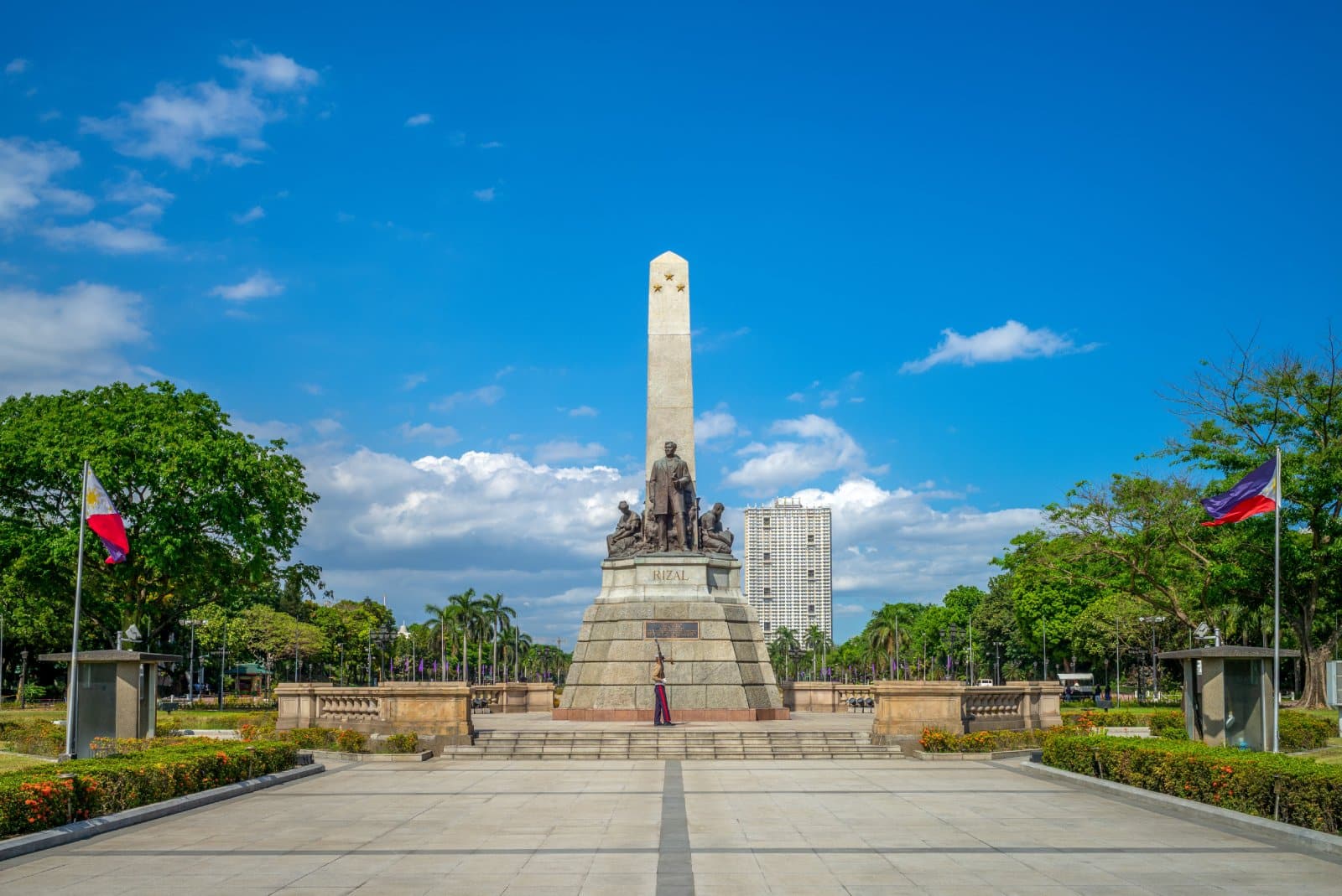 <p class="wp-caption-text">Image Credit: Shutterstock / Richie Chan</p>  <p><span>Rizal Park, also known as Luneta Park, is a historical urban park in the heart of Manila, Philippines. Spanning approximately 58 hectares, it is one of the largest urban parks in Asia. Named after Dr. José Rizal, the Philippines’ national hero, the park commemorates his execution in 1896, a pivotal moment in the Philippine Revolution against Spanish colonial rule. The park’s centerpiece is the Rizal Monument, which contains the hero’s remains and symbolizes Filipino nationalism and bravery.</span></p> <p><span>Established in the early 1820s as an open space, Rizal Park has become a significant cultural and historical landmark. It serves multiple functions: a leisure and recreational space for residents and tourists, a ceremonial and symbolic venue for national events, and a beautifully green oasis amidst the urban landscape of Manila.</span></p> <p><span>The park features well-manicured gardens, historical markers, museums, an open-air concert hall, and monuments dedicated to other Filipino heroes and historical events. Notable attractions within the park include the National Museum of the Philippines, the National Library, the Planetarium, and the beautifully landscaped Japanese and Chinese Gardens.</span></p>