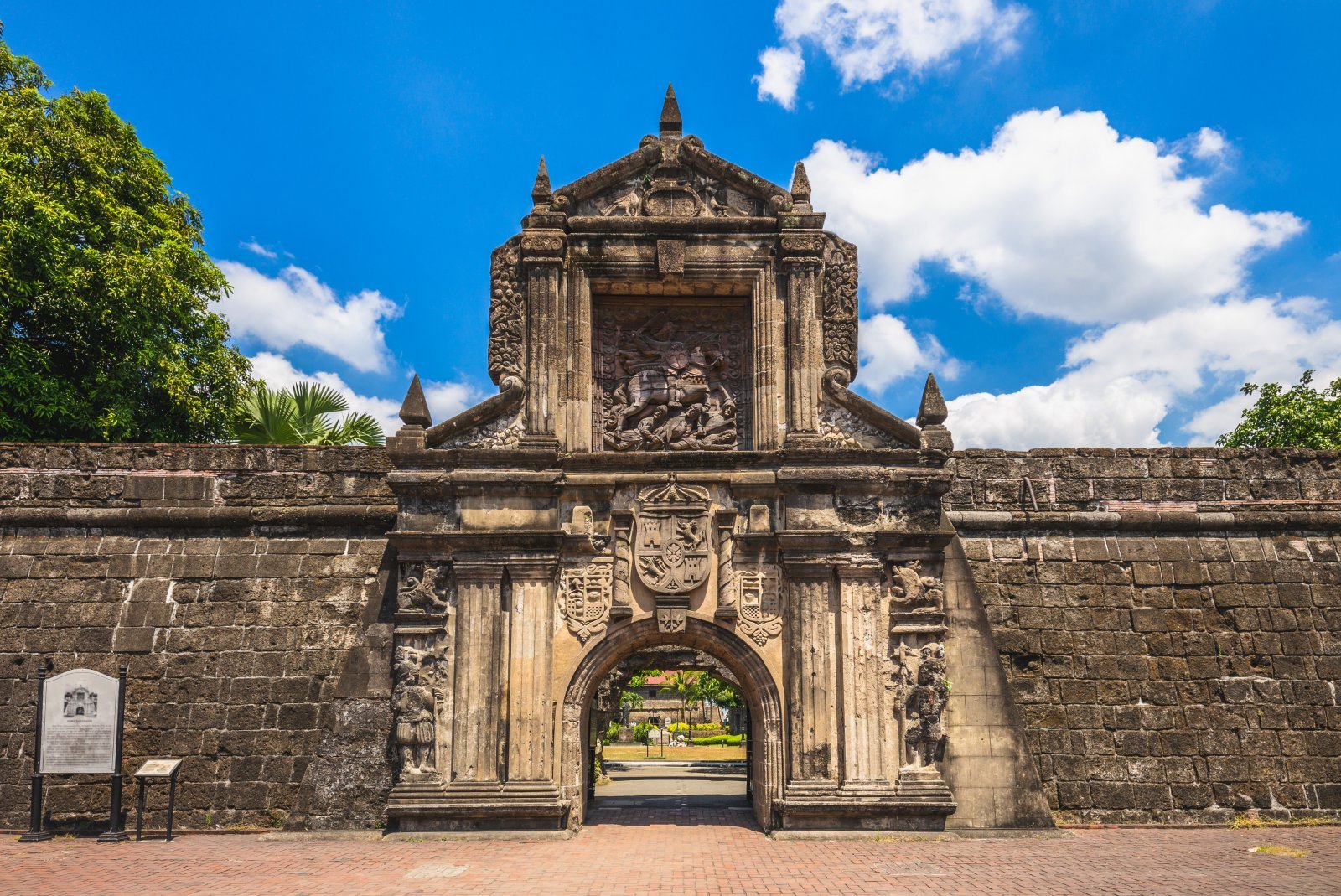 <p class="wp-caption-text">Image Credit: Shutterstock / Richie Chan</p>  <p><span>Fort Santiago, located in the historic walled city of Intramuros in Manila, Philippines, is a citadel first built by Spanish conquistador Miguel López de Legazpi in the late 16th century. This fortress is part of the structures of the city of Manila, deemed of great historical, cultural, and architectural significance.</span></p> <p><span>Initially constructed in 1571, the fort is named after Saint James the Great (Santiago in Spanish), the patron saint of Spain, and was designed to protect the newly formed city from foreign invasions and pirate attacks. Over the centuries, Fort Santiago has played a crucial role in the country’s history, serving variously as a military barracks, a prison, and a site of numerous significant events in Philippine history.</span></p> <p><span>The fort is perhaps best known for its association with Dr. José Rizal, the Philippines’ national hero, who was imprisoned here before his execution in 1896. His final footsteps from his cell to the location of his execution are marked by bronze footprints, making it a poignant site of pilgrimage for many Filipinos.</span></p> <p><span>Fort Santiago has impressive stone walls and ancient gates, and its location is at the mouth of the Pasig River. Its design incorporates medieval and Renaissance elements, with its defensive structure reflecting the military architectural techniques of the period. Today, it houses the Rizal Shrine Museum, dedicated to the life and works of José Rizal, and features well-preserved dungeons, cannons, and the iconic Rajah Sulayman Theater.</span></p> <p><span>As an important historical and tourist site, Fort Santiago offers visitors insights into the Philippines’ colonial past, the struggle for independence, and the heroism of one of its most revered figures. </span></p>
