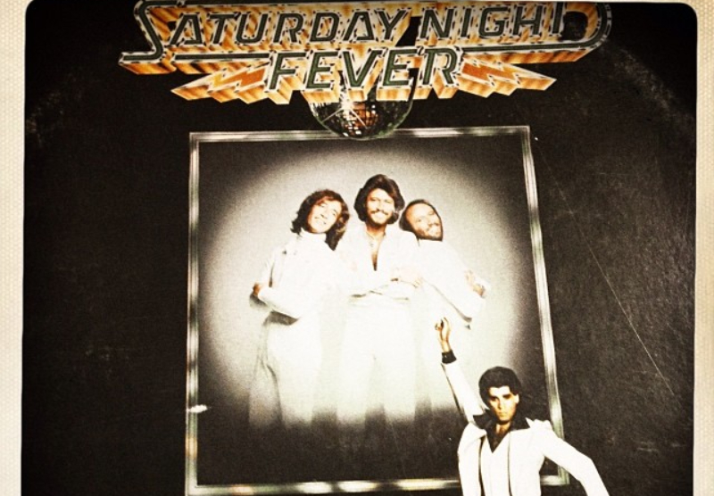 <p>Just as Gibb’s star was ascending, his brothers gave him a run for his money.<em> Saturday Night Fever </em>was a mega hit movie, and the Bee Gees were all over the soundtrack. To radio listeners, it seemed as if almost every hit had something “Gibb” about it. When it came to the top spot on the Hot 100, it was one Gibb song replacing another. </p>  <p>Gibb was becoming super famous—famous enough to attract the attention of Australian pop star royalty. </p>