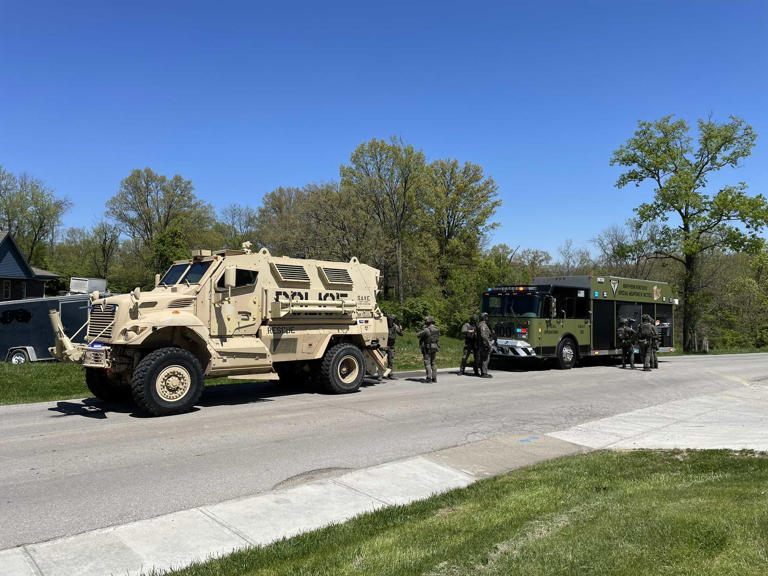 SWAT units are on the scene at a Northern Kentucky home after a man threatened to kill multiple people, including police, Monday.