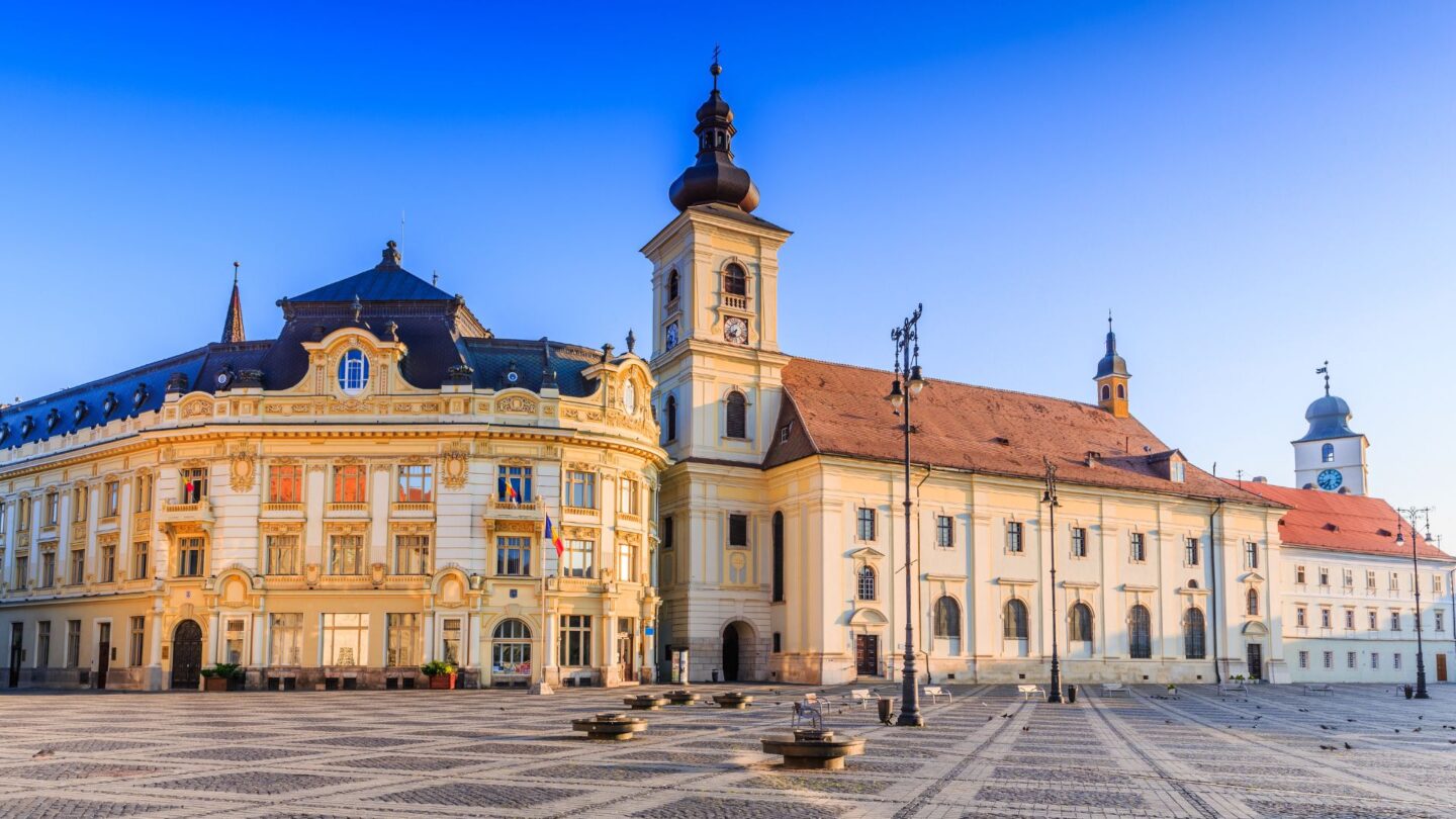 <p>Imagine exploring an outdoor museum, where you’ll witness colorful houses and grand squares at every turn-this is what Sibiu, Romania, offers its tourists. Though the city is not as famous as other main attractions of Europe, it’s an ideal destination for those looking to explore the medieval buildings without the overwhelming crowds. </p>