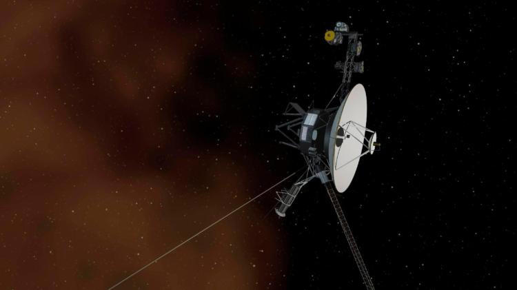 Un concept d'artiste non daté représente la sonde Voyager 1 de la NASA entrant dans l'espace interstellaire, en dehors de notre système solaire. La sonde, âgée de 36 ans, se trouve à plus de 20 milliards de kilomètres de notre soleil. Image d'illustration.