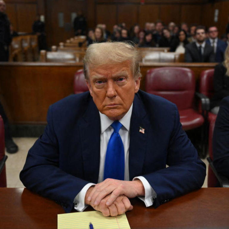 Former President Donald Trump sits in Manhattan Criminal Court