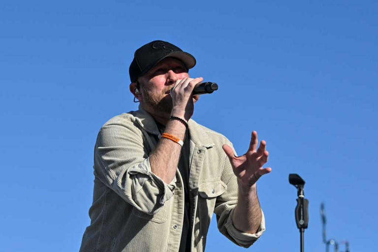 PONTE VEDRA BEACH, FLORIDA - MARCH 12: Singer-songwriter Cole Swindell performs during the Military Appreciation Day Ceremony prior to THE PLAYERS Championship at Stadium Course at TPC Sawgrass on March 12, 2024 in Ponte Vedra Beach, Florida. (Photo by Ben Jared/PGA TOUR via Getty Images)