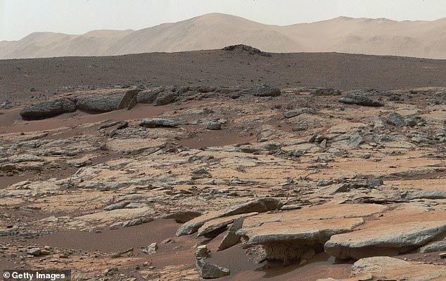nasa finds traces of gas that could be a sign of life near mars crater