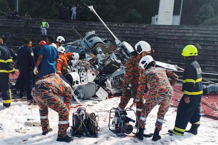All 10 crew members killed after two naval helicopters collide mid-air during training in Malaysia