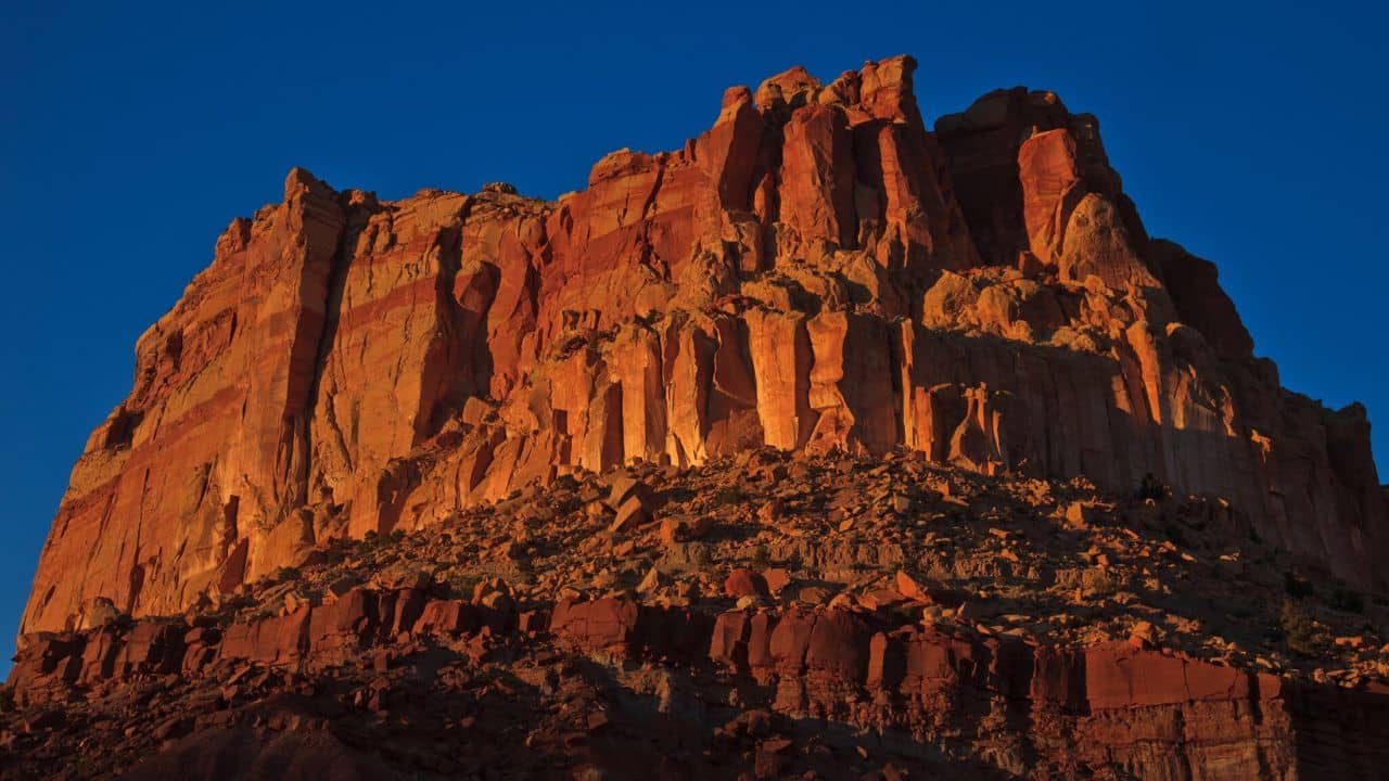 <p>Utah’s national parks are among the most popular in the country. If you’re looking for a balance between busy and more relaxed parks, a journey between Arches, Canyonlands, and Capitol Reef is a great option.</p><p>Arches is a relatively small park that attracts many visitors during the high season. Arrive early in the morning to bypass the crowd and experience sunrise at the top of the famous Delicate Arch. Then, you can drive the short 30-minute stretch to Canyonlands, where the expansive canyons and buttes stretch far into the distance.</p><p>Finish up your exploration by driving the two hours to Capitol Reef, where you can see the <a href="https://www.nps.gov/care/index.htm" rel="nofollow noopener">Waterpocket Fold</a>, a giant wrinkle on the earth that spans 100 miles.</p>