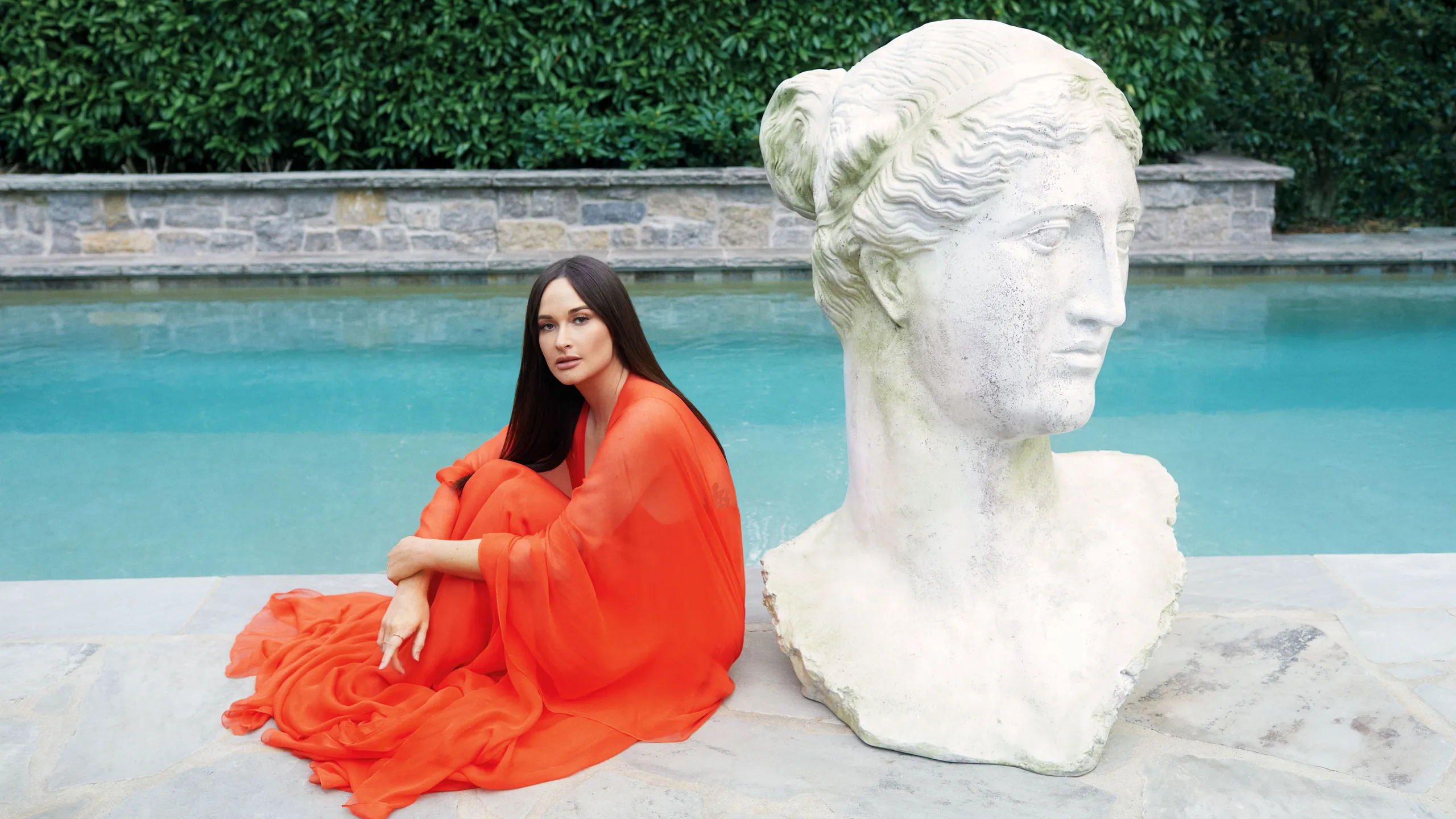 <p>In the dreamy ballad "Slow Burn," Kacey Musgraves blends the twang of country with the whimsy of singer-songwriter storytelling, all while nodding to the influence of an acid trip. Recalling the genesis of the song, Musgraves paints a picture of tranquility, sitting on her porch under the stars, where inspiration struck like a gentle breeze. Penning down her thoughts that evening, she captured the essence of her psychedelic experience, infusing the melody with a sense of otherworldly enchantment. Musgraves doesn't shy away from acknowledging the role of LSD in her creative process, highlighting its ability to expand the mind and spark unconventional insights. This sentiment echoes in her song "Oh What A World," where she muses about the transformative power of nature and consciousness.</p>