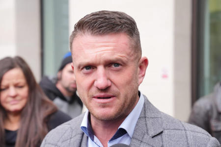Tommy Robinson cleared of refusing to leave march after police paperwork 