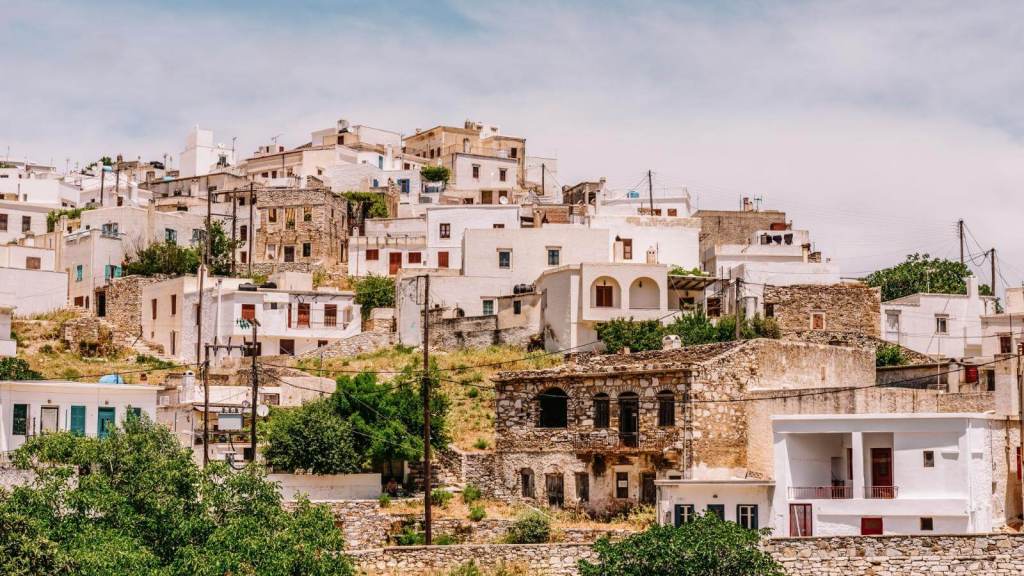 <p>The village of Apeiranthos is home to many historical sites and museums. Sitting on a hilltop, you can explore the Archaeological Museum of Naxos, the small Museum of Folk Art, Nikos Glezos’ library, the Church of Panagia Aperathitissa, and much more.</p><p>For a delicious cup of coffee, you’ll find several cafes and taverns that can satiate your caffeine needs. Lined with whitewashed houses, this <a href="https://worldwildschooling.com/most-beautiful-european-villages/">quaint village</a> should be at the top of your bucket list.</p><p class="has-text-align-center has-medium-font-size">Read also: <a href="https://worldwildschooling.com/hidden-gems-in-southern-europe/">Hidden Gems Of Southern Europe</a></p>