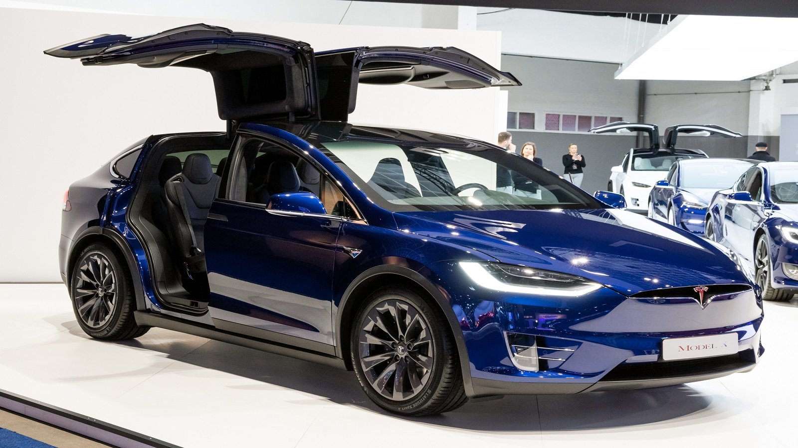 <p>The Tesla Model X has made quite an impact in the electric vehicle market. However, there are a few reasons why some prospective buyers might want to think twice before purchasing this specific model in 2024.</p><ul> <li><strong>High Price Tag</strong>: The Model X is known for its expensiveness. While this can be justified by its advanced technology, other EV models may offer similar features at a lower price.</li> <li><strong>Falcon Wing Doors</strong>: The unique <strong>Falcon Wing doors</strong> are a distinctive design choice, but they come with their share of practical issues, such as dealing with tight parking spaces or potential extra maintenance costs.</li> <li><strong>Availability of Alternatives</strong>: The EV market is rapidly growing, and the number of options for consumers is increasing. There are many new models to consider, some of which may provide better value.</li> <li><strong>Potential for Decreased Popularity</strong>: As the market becomes more saturated, the Tesla Model X could lose some of its popularity among consumers.</li> </ul>
