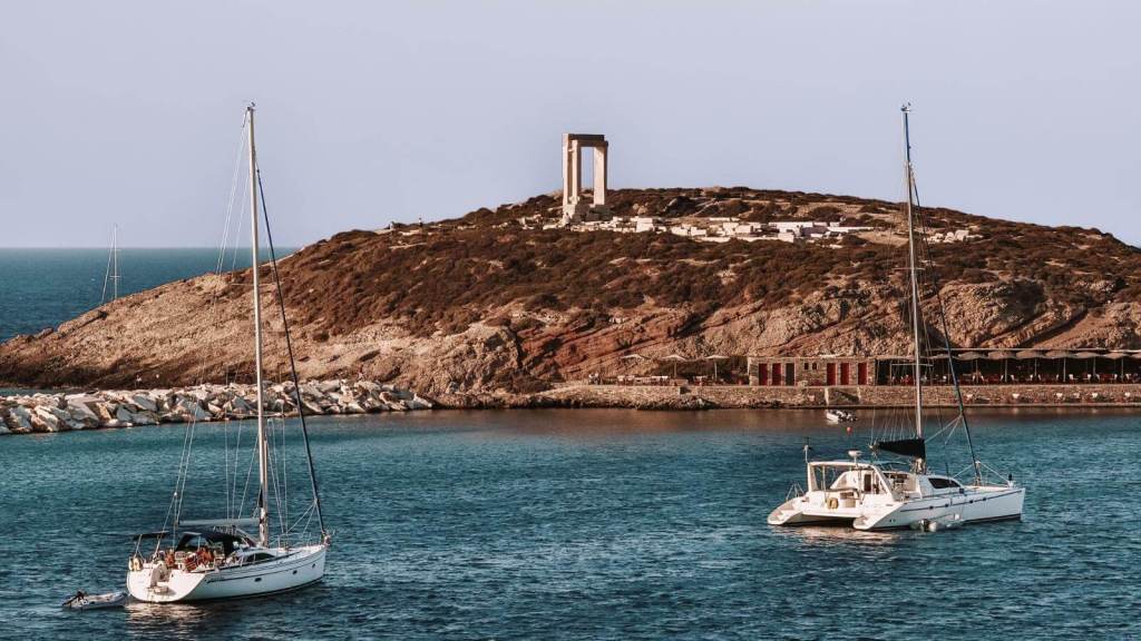 <p>To enjoy the blue waters of the Aegean Sea, you can sprint across the water on a boat tour and explore hidden gems. The tours usually last a day and have varying facilities depending on your choice. You can opt for private tours that serve top-tier food, wine, and premium amenities or go for something more budget-friendly.</p><p>In many of these tours, you’ll also be able to explore several caves, like the Koyfonissia cave. A catamaran cruise is also one of the top things to do in Greece.</p><p class="has-text-align-center has-medium-font-size">Read also: <a href="https://worldwildschooling.com/corfu/">Best Things To Do in Corfu, Greece</a></p>