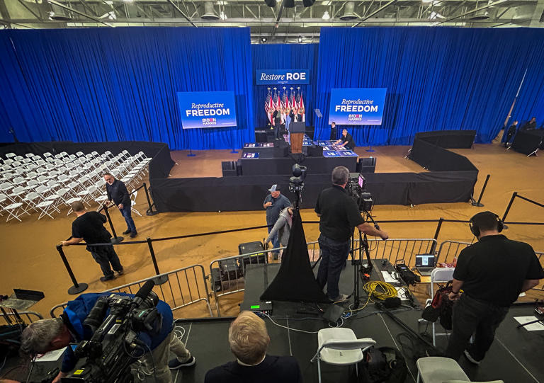 Reporters and photographers set up equipment at Hillsborough Community College in anticipation of President Joe Biden’s visit later this afternoon in Tampa.
