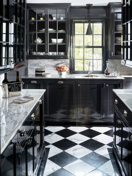 <p>In this Connecticut butler's pantry, the black-and-white marble flooring sets a glamorous tone, echoed in lacquered onyx paint on the home's original woodwork and newly milled appliance fronts—too many coats to count, notes <a href="https://sarahblankdesignstudio.com/">designer Sarah Blank</a>.</p><p>"There are no shortcuts with high-gloss paint, so it took about six weeks," she says. "But it was worth it—the black is so rich."</p>
