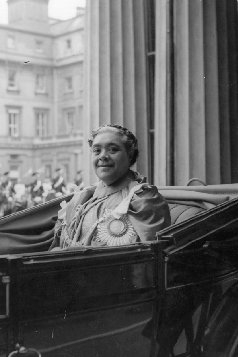 <p>                     In true British fashion, the Queen's Coronation Day was a rainy one. And one guest in particular won the hearts of onlookers with her response. Queen Salote Tupou III of Tonga kept the roof of her carriage down, beaming at the crowds, despite the miserable weather.                    </p>