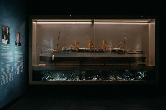  Wallace Chung’s scale model of the Canadian Pacific steamship the Empress of Asia “floats” above a new display at the Chung/Lind Gallery that looks like the ocean floor. UBC photo.