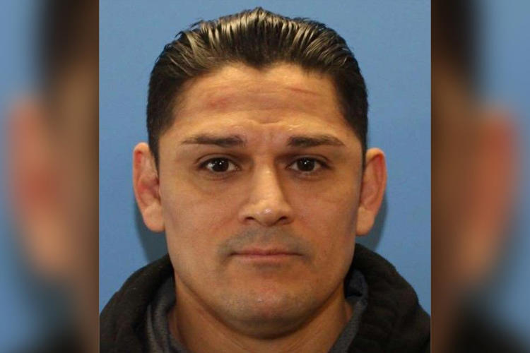 Fugitive ex-police officer wanted over two murders found with gunshot wound while infant with him is safe