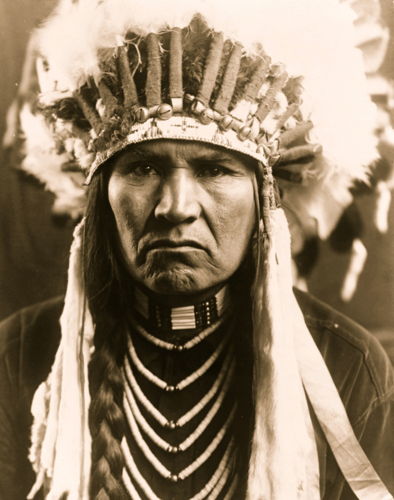 What is the significance of the Native North American headdress?