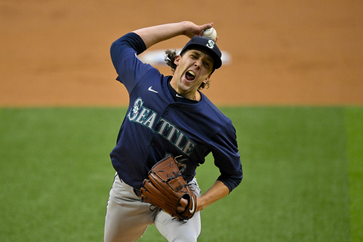 mariners knock rangers from first place in al west