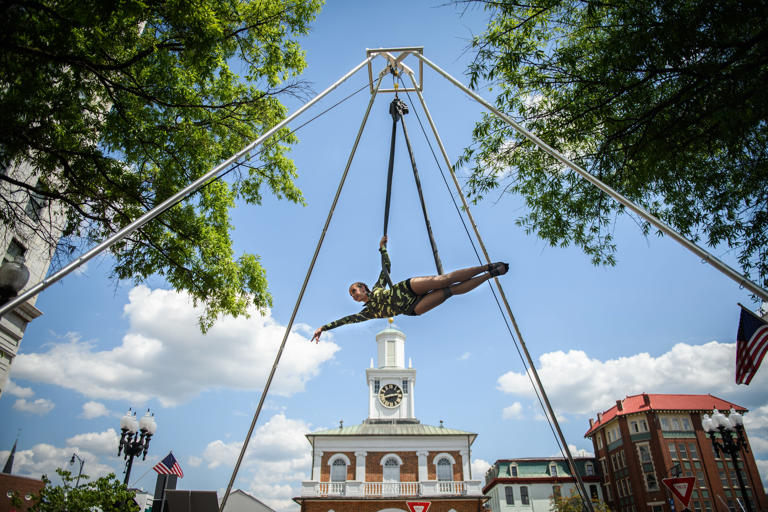 Patricia Marrero, of Air Born Aerials, performs aerial tricks in front of the Market House at the Dogwood Festival on Saturday, April 28, 2018. Air Born Aerials will also be performing at the 2024 Dogwood Festival on Saturday, April 27.