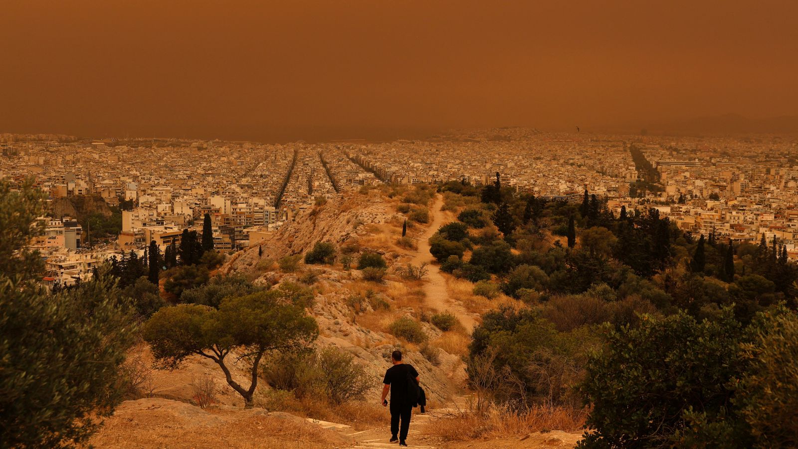 skies over athens turn 'apocalyptic' orange from sahara dust storm