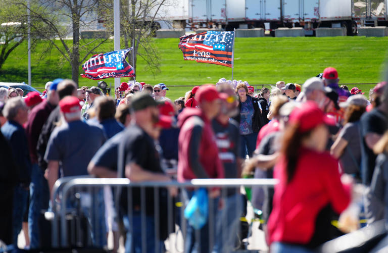 A large crowd waited outside the Waukesha County Expo Center, where Trump held a rally in May. The line snaked through part of the parking lot.