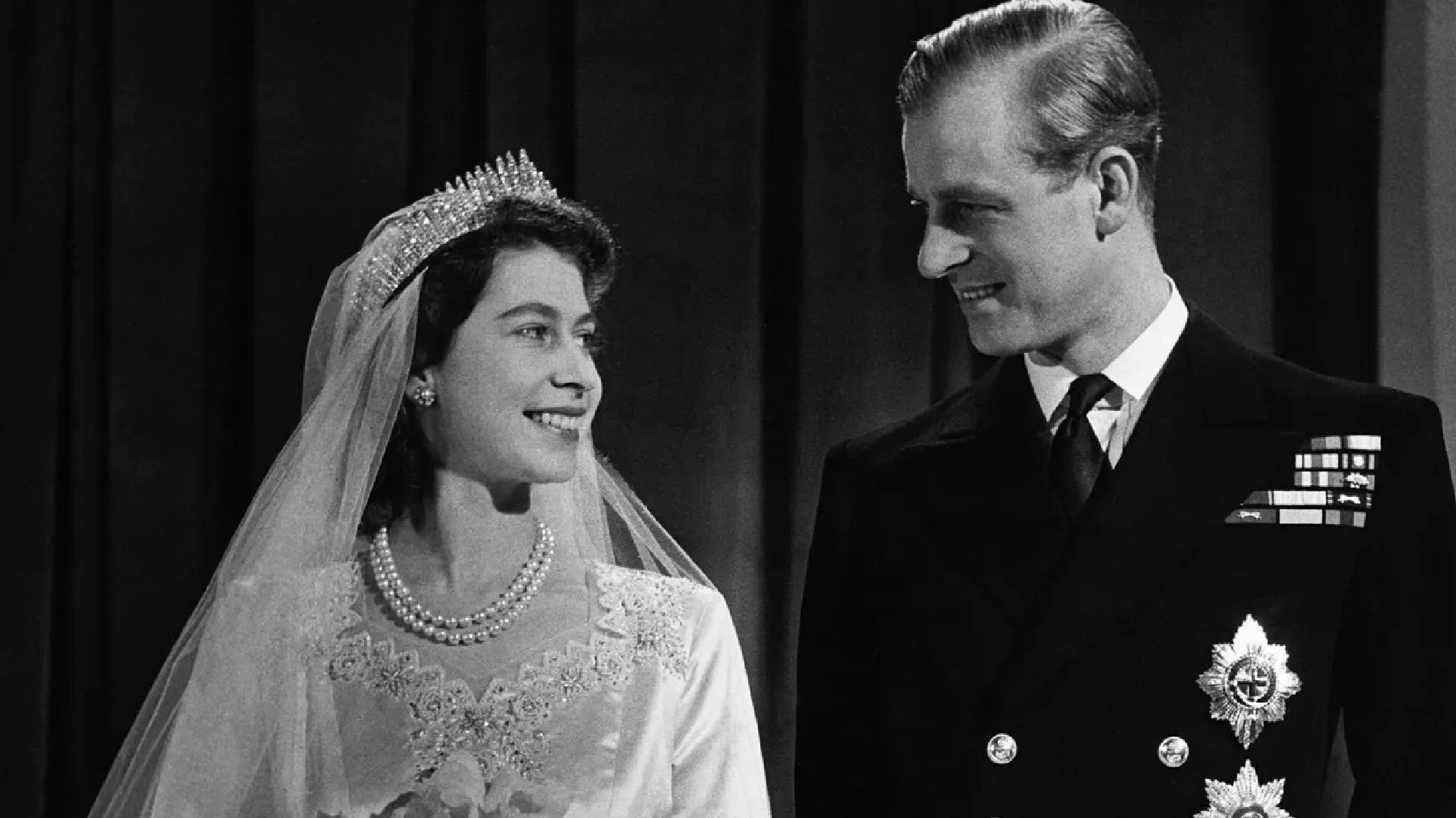 <p>                     Four months after announcing their engagement, Princess Elizabeth and Prince Philip married at Westminster Abbey. A staggering 2,000 guests were invited to the wedding, which was broadcast by BBC Radio to 200 million people globally. Queen Elizabeth and Prince Philip couldn't have looked more in love on their special day.                   </p>