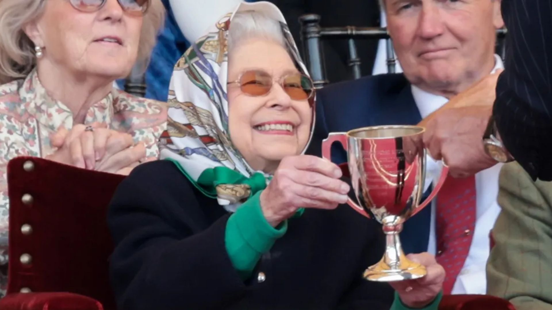 <p>                     Held annually in Windsor Home Park near Windsor Castle, the Royal Windsor Horse Show is a time when fans have often been treated to a rare glimpse of the monarch in a more casual setting. Here, she's pictured beaming with delight during her appearance, even receiving the winner's cup.                   </p>