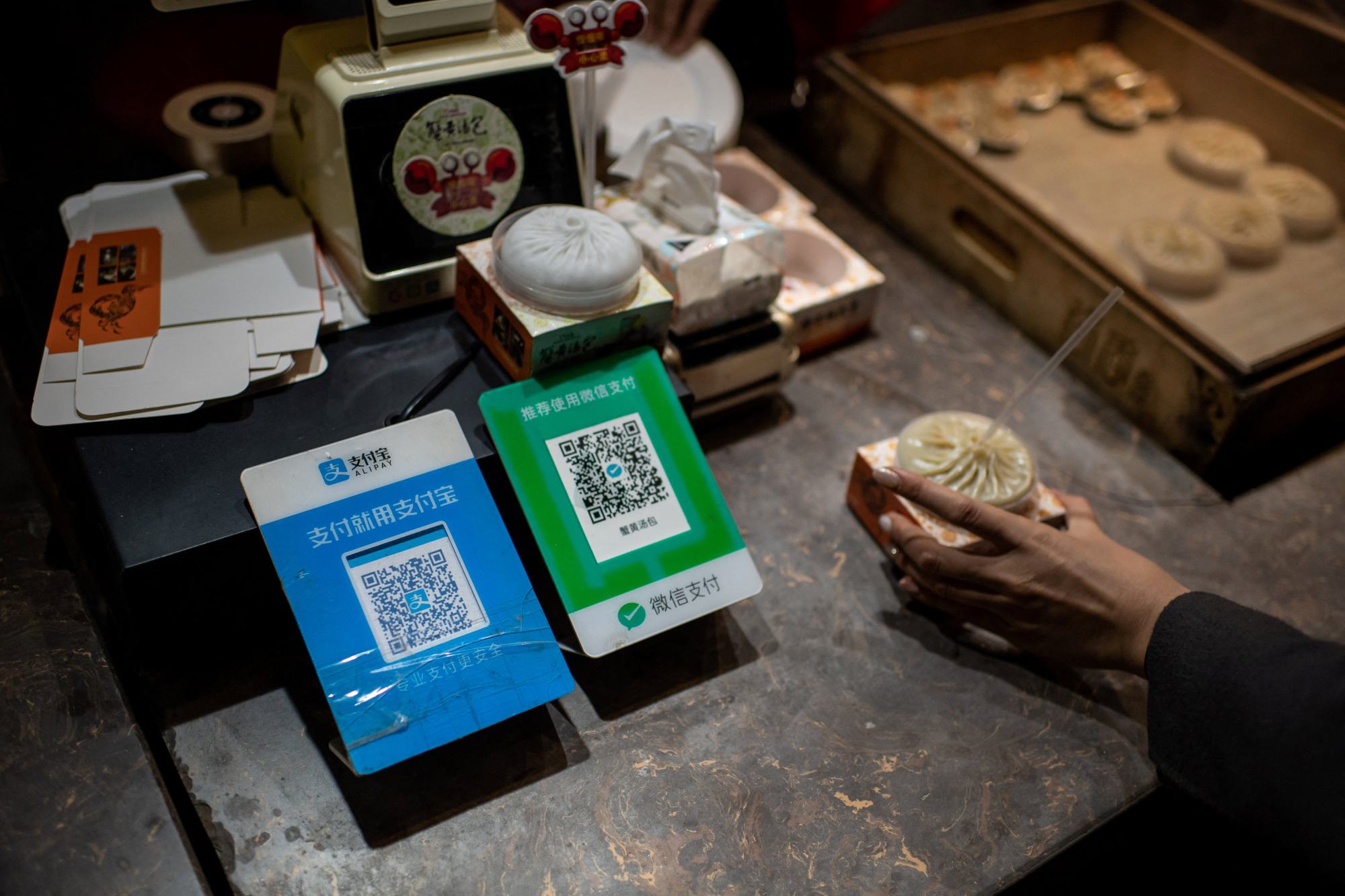 china sends message it wants foreign visitors to spend money, whether they pay in cash or through mobile payment apps