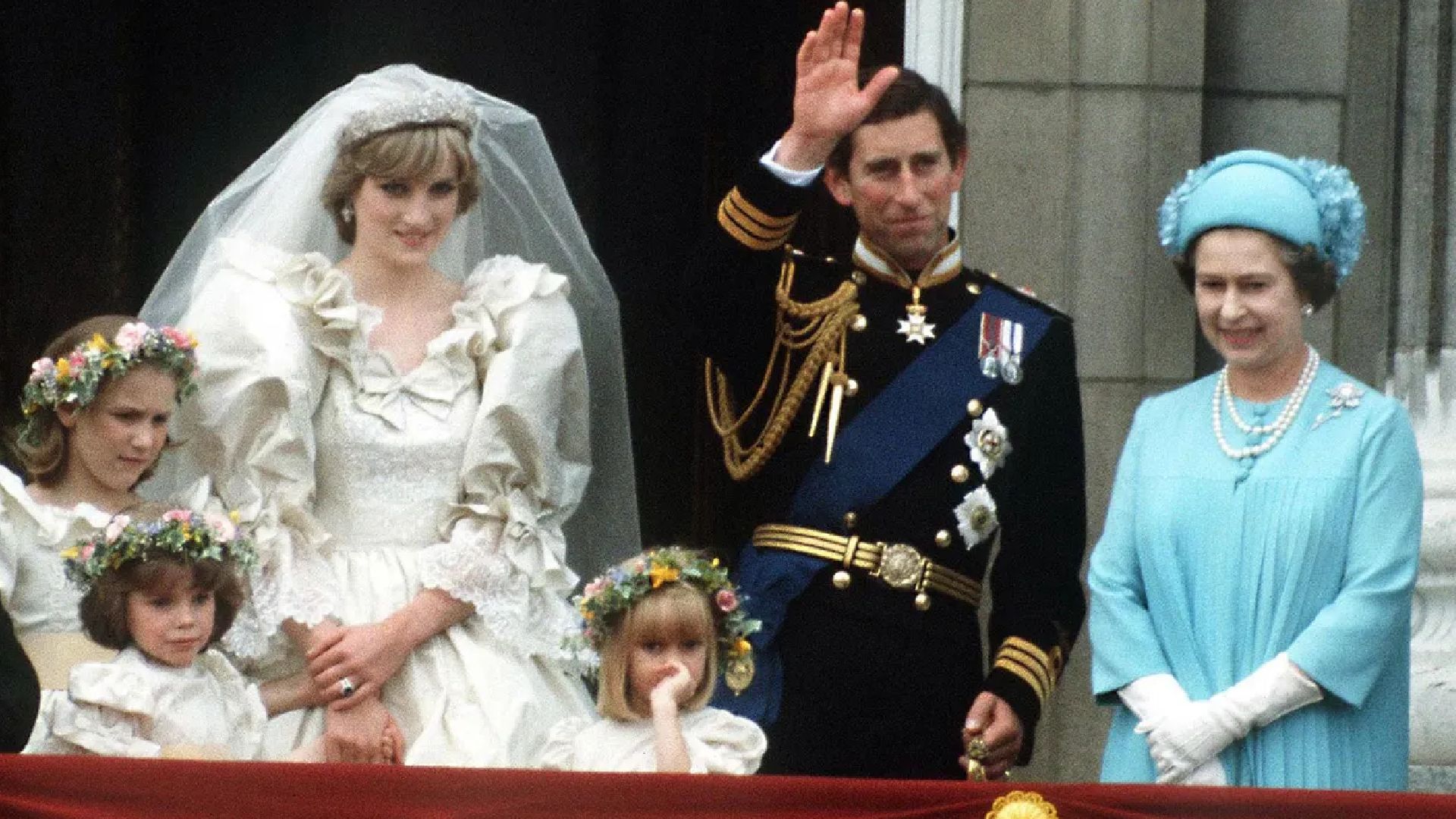 <p>                     Queen Elizabeth was a guest of honour as the then-Prince Charles married Lady Diana Spencer at St Paul’s Cathedral in 1981. Crowds lined the streets to see the newlyweds and Her Majesty, with the Queen opting for a vibrant blue outfit for the momentous occasion. All three waved to the crowds from the balcony of Buckingham Palace in one of the most unmissable moments in royal history.                   </p>