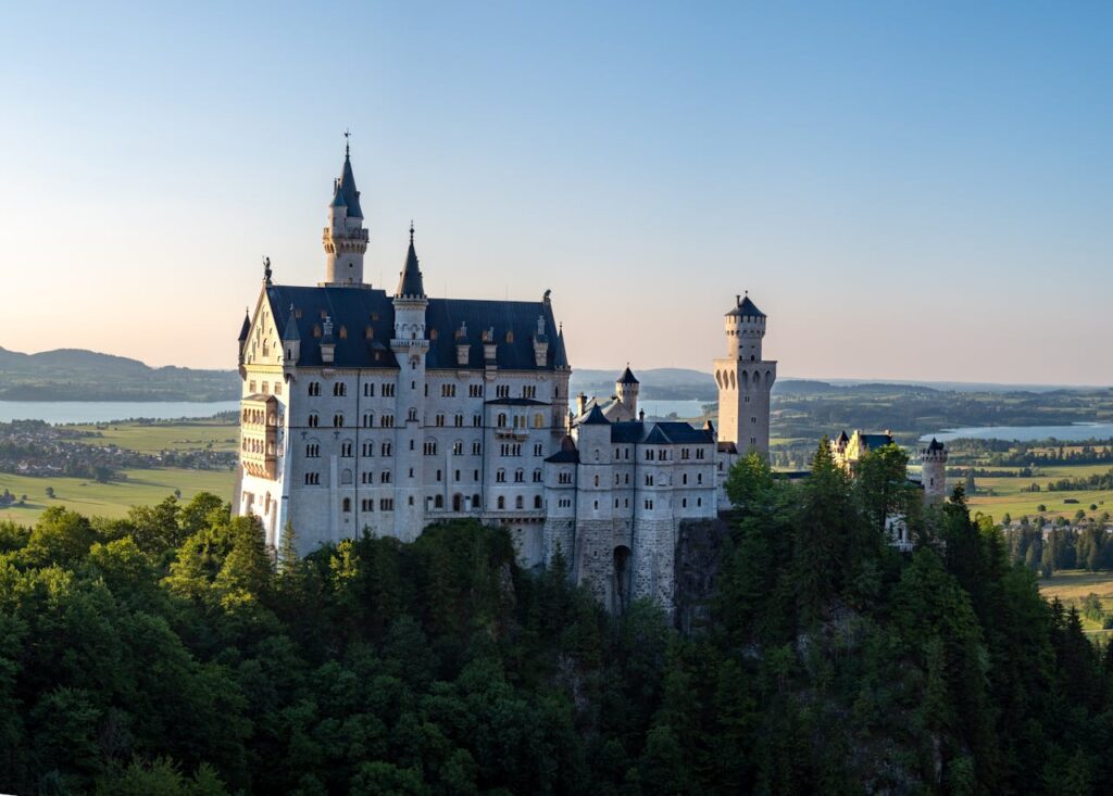 <p>Built by King Ludwig II of Bavaria, Neuschwanstein Castle is a fairy-tale-like palace nestled in the Bavarian Alps. Its romantic architecture and scenic surroundings have inspired numerous fictional castles in media and culture.</p>