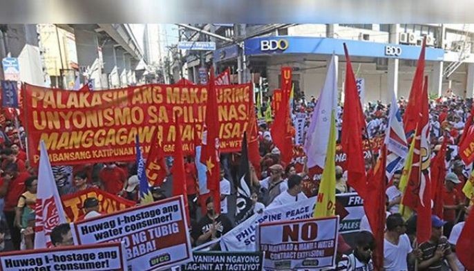 dole assures workers of pay hike after wage review