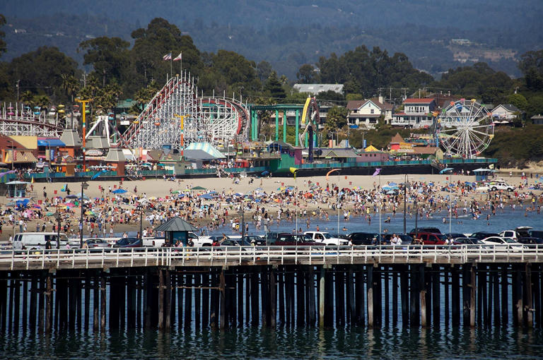 SANTA CRUZ, CA - JULY 29: A general view of the Santa Cruz Wharf, with the Santa Cruz Beach and Boardwalk amusement park behind on July 29, 2007 in Santa Cruz, California. (Photo by Stephen Dunn/Getty Images)