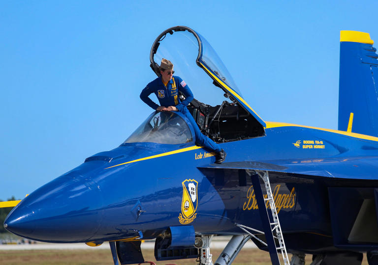 U.S. Navy Blue Angels Lt. Cmdr. Amanda Lee exits the cockpit of her F/A-18 Super Hornet, Thursday, May 2, 2024, at the Vero Beach Regional Airport ahead of the weekend air show. The six-plane team will perform Saturday and Sunday.