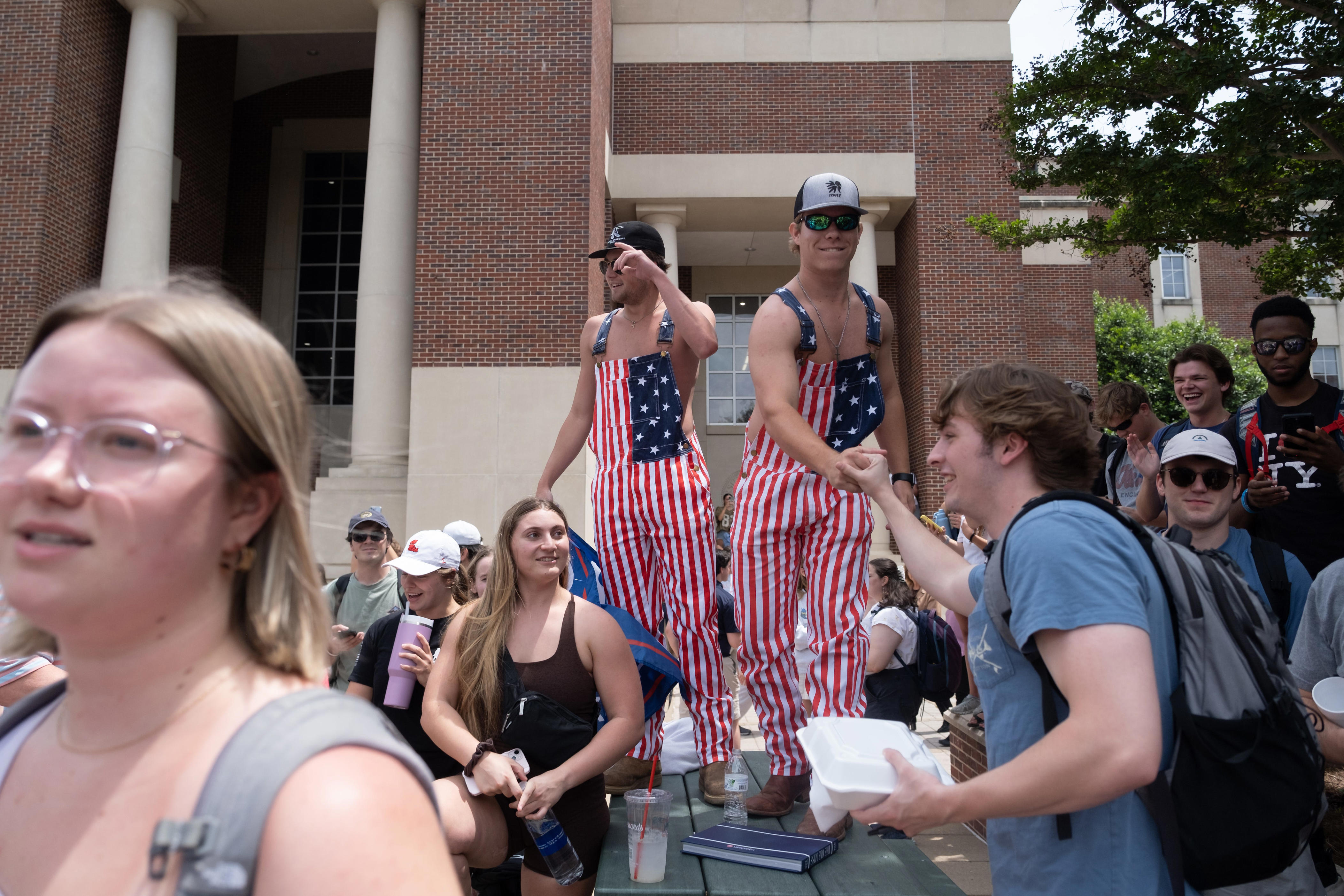 photo of university of mississippi students with 'trump won' flag is altered | fact check