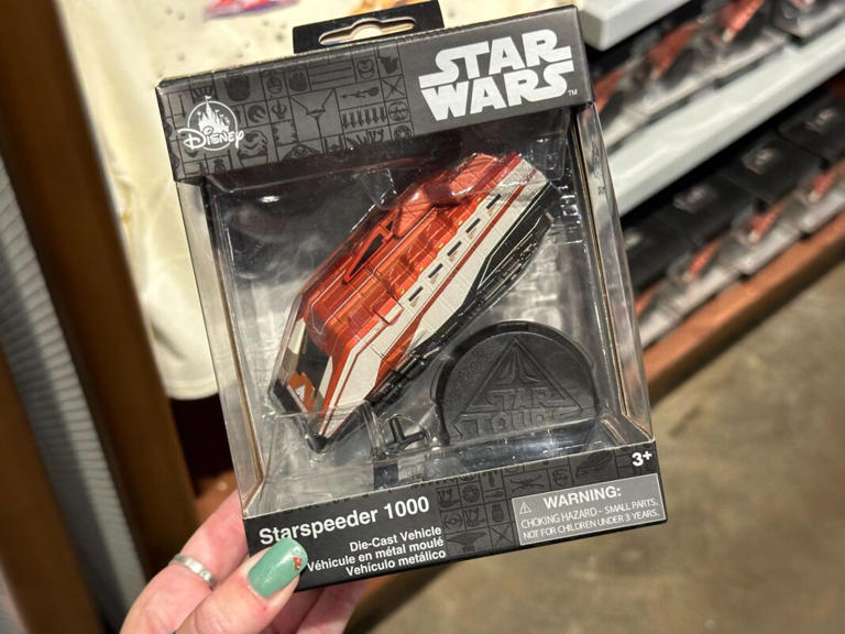 A new die-cast figure of the Starspeeder 1000 from Star Tours is available at Disney’s Hollywood Studios. Die-Cast Starspeeder 1000 – $17.99 The die-cast vehicle includes a black plastic stand featuring the Star Tours logo. The ship is a burnt orange color with white stripes down the side and black on the bottom. This die-cast ... Read more