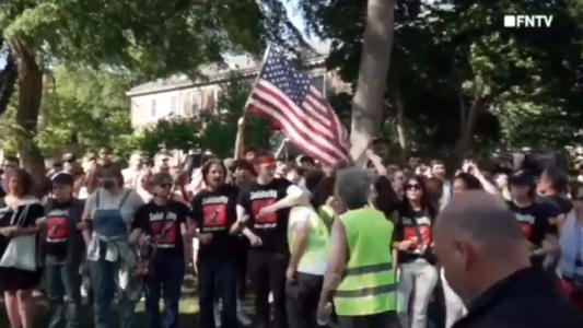 Rutgers students counter anti-Israel agitators on campus by waving American flag, chanting 
