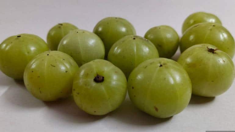 8 benefits of drinking amla juice regularly, a tangy potion to boost immunity, keep hair healthy