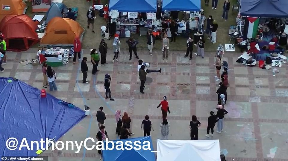 Frightening drone footage shows UCLA protesters combat training