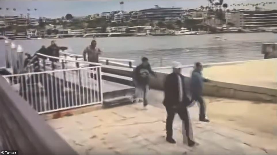 Moment migrants sprint off yacht in California sneaking into America