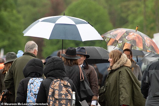 smiling king charles is embraced by zara tindall at windsor horse show